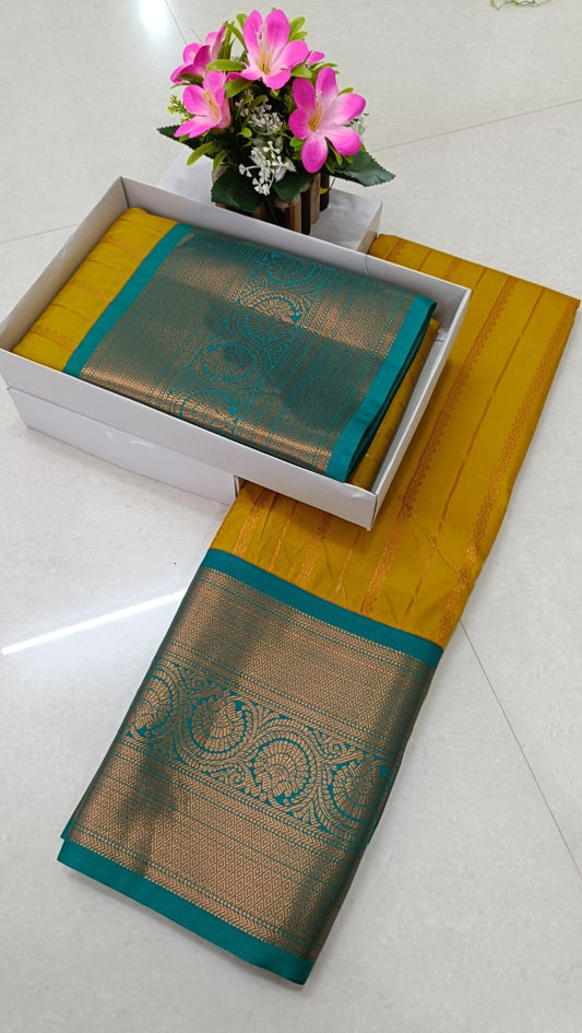 mustard yellow and turquoise pattu saree