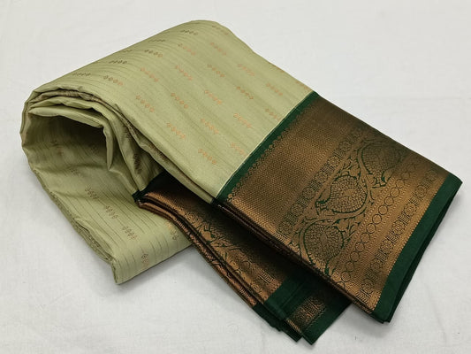 Cream and Forest Green - Semi silk saree