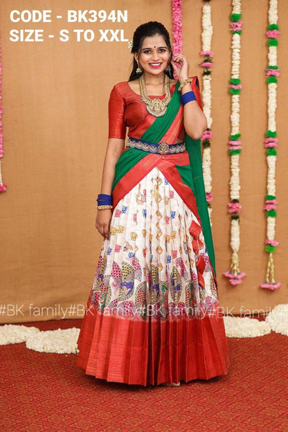 Charming Off white kalamkari half saree paired with a wonderful golden zari pink Duppata, pattu lehenga