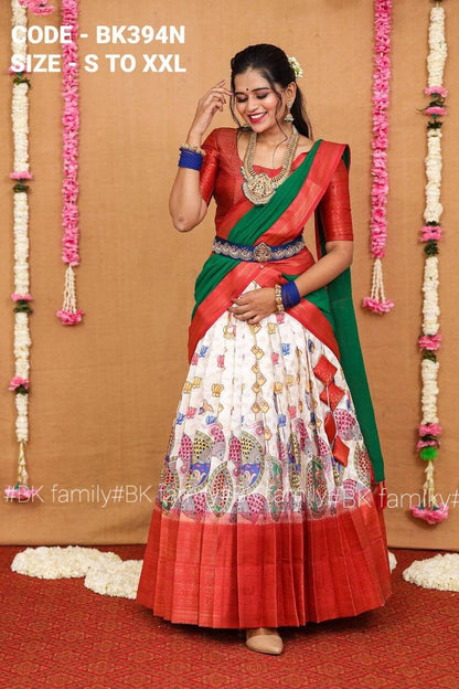 Charming Off white kalamkari half saree paired with a wonderful golden zari pink Duppata, pattu lehenga